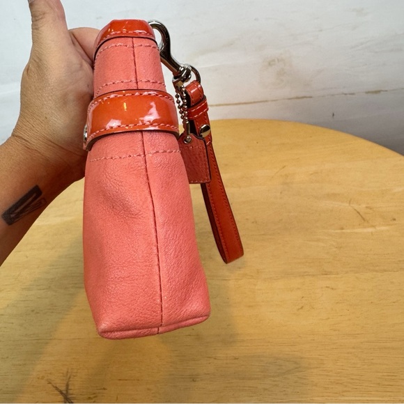 Coach | Orange Punch-Out Pattern Wristlet - Picture 8 of 13
